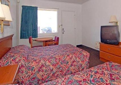 a hotel room with two beds and a television at Americas Best Value Inn Richmond VA Midlothian Turnpike in Richmond