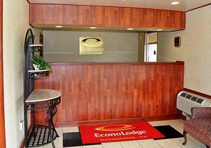 a lobby with a bar with a red rug on the floor at Americas Best Value Inn Richmond VA Midlothian Turnpike in Richmond