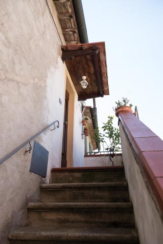 a set of stairs leading up to a building at Accasamia Terricciola in Terricciola