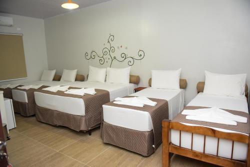 Katil atau katil-katil dalam bilik di Recanto das Carpas