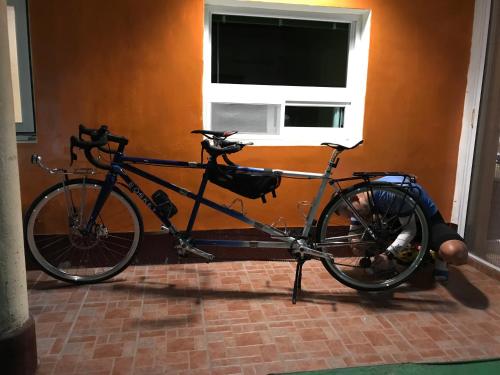 a bike parked in a room next to a window at Color Rainbow Home in Taimali