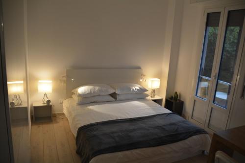 A bed or beds in a room at Maison SAGM&C
