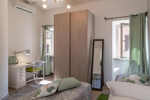 Ένα ή περισσότερα κρεβάτια σε δωμάτιο στο Casa Sferisterio Macerata