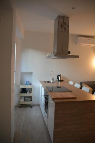 A kitchen or kitchenette at Maison SAGM&C