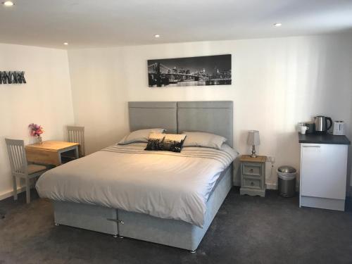 Cama o camas de una habitación en Fornham Guest House