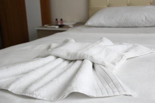 Ένα ή περισσότερα κρεβάτια σε δωμάτιο στο Marpalace Hotel