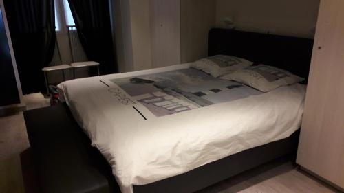 
A bed or beds in a room at Bella Vista First Class
