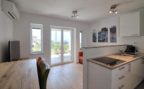 a kitchen with a sink and a counter top at BC Eleven - mit Zentralheizung in Senj