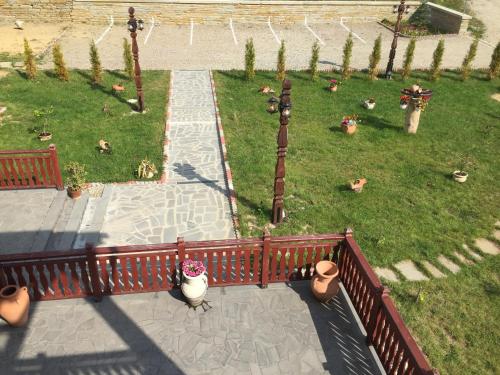 an aerial view of a garden with plants and flowers at Pensiunea Zana Muntilor in Piatra Fantanele