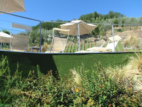 Κήπος έξω από το Valle apartments