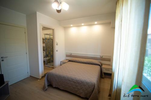 Postel nebo postele na pokoji v ubytování B&B Terra Mare