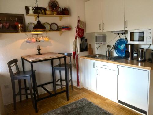 Köök või kööginurk majutusasutuses Charmant Wohnen
