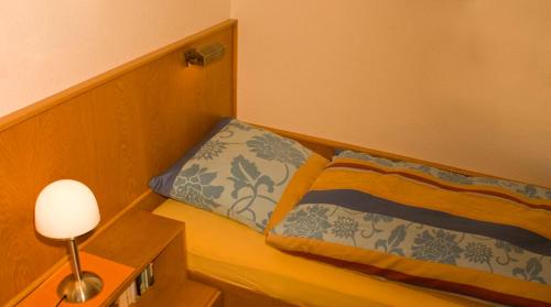Ein Bett oder Betten in einem Zimmer der Unterkunft Ferienwohnung Familie Böckmann auf Norderney