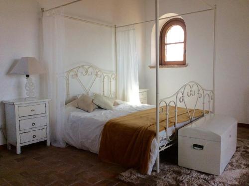 Strada delle Zamponare 1 tesisinde bir odada yatak veya yataklar