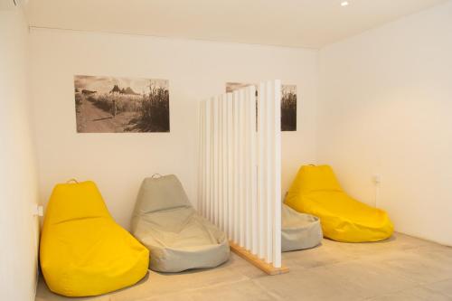 Coin salon dans l'établissement Tropical Attitude (Adults Only)