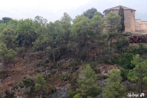 an old building on top of a hill with trees at Casa Rural Casa Gimeno in Bocairent