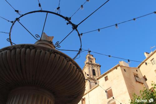 a view of a church from behind a fence at Casa Rural Casa Gimeno in Bocairent