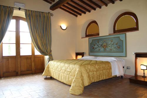 Posteľ alebo postele v izbe v ubytovaní San Carlo a La Molinella