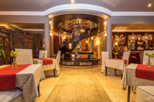 Un lugar para sentarse en Alexander Guest House
