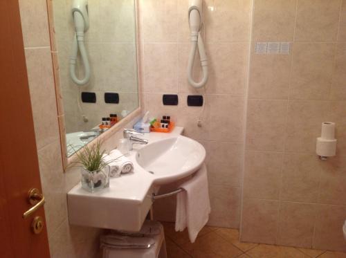 Een badkamer bij Hotel Villa Ca' Nova ***S