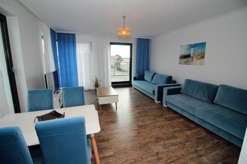 Гостиная зона в Apartamenty Przy Latarni Kropla Bałtyku