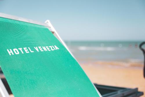 a green book with the words hotel yerevan on it at Hotel Venezia New in Vasto
