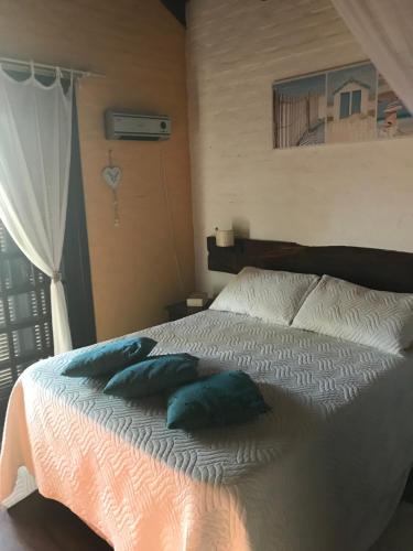 Postel nebo postele na pokoji v ubytování Casa Amigable y Disfrutable