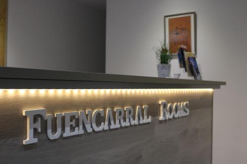 a sign for a peregrinianolisarmaolisquarteredquarteredquarteredquarteredstration at Fuencarral Rooms in Madrid