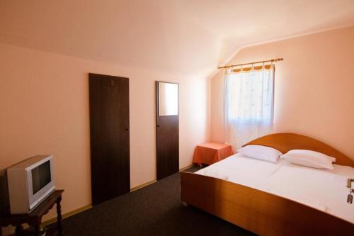 Postel nebo postele na pokoji v ubytování Casa Dany