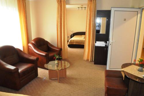 Postel nebo postele na pokoji v ubytování Hotel Andrei
