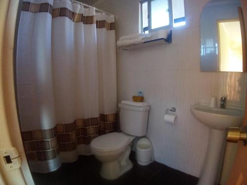 Koupelna v ubytování Inti Hotel
