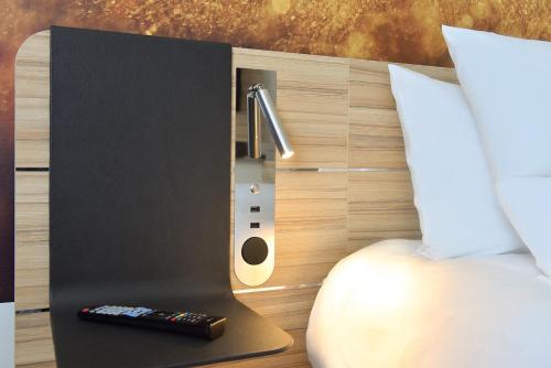 Novotel Wavre Brussels Eastにあるベッド