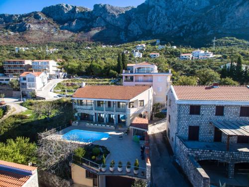 an aerial view of a villa with a swimming pool at Villa Narcissus Montenegro KO Sveti Stefan in Sveti Stefan