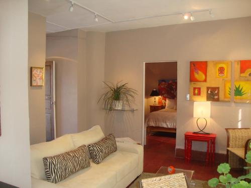 Ένα ή περισσότερα κρεβάτια σε δωμάτιο στο Suites Santo Domingo