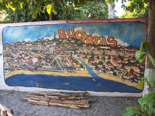 a large sign with a picture of a city at Aventura Pacifico Boutique Suites & Villas in Bucerías