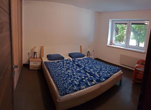 Postel nebo postele na pokoji v ubytování TopSenec-Lakeside Home