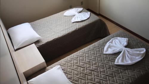 Hotel Ricardi Express tesisinde bir odada yatak veya yataklar