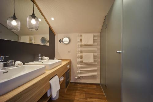 Ванная комната в Wellnesshotel Zum Koch