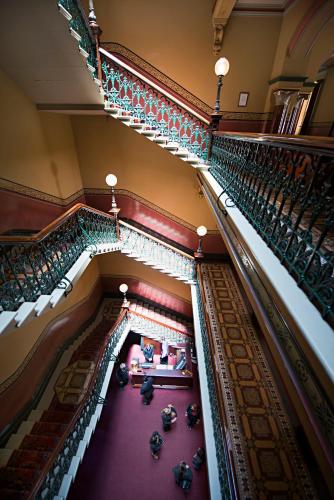 an overhead view of a staircase in a building at The Hotel Windsor in Melbourne