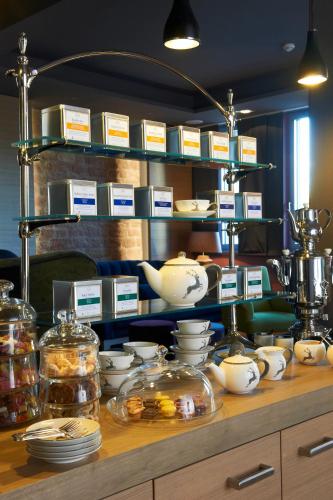 a counter with bowls and dishes on a table at Lösch für Freunde in Hornbach