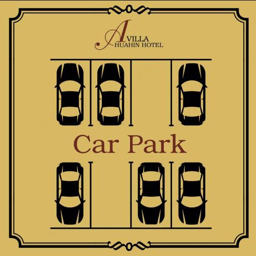 a sign for a car park with three parked cars at A Villa Hua Hin Hotel in Hua Hin