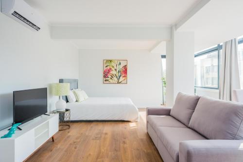 Postel nebo postele na pokoji v ubytování 137 LuxResidence