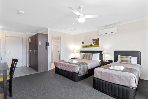 Ένα ή περισσότερα κρεβάτια σε δωμάτιο στο Blackwater Central Motel