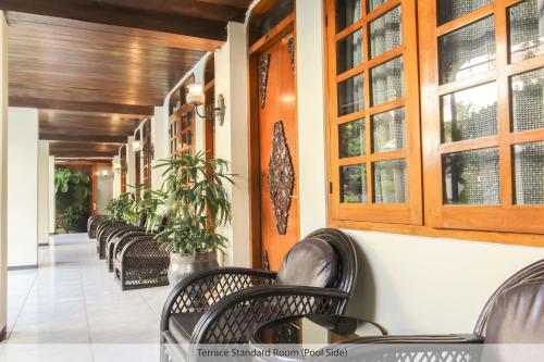 Гостиная зона в Duta Guest House