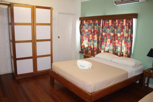 Säng eller sängar i ett rum på Taklam Lodge And Tours