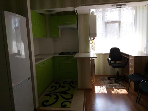 Kjøkken eller kjøkkenkrok på Geo Apartament