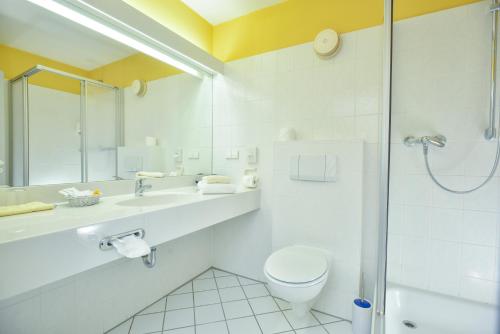 
Ein Badezimmer in der Unterkunft Hotel Fasanengarten
