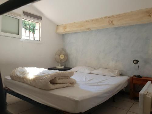Postel nebo postele na pokoji v ubytování Duplex Hyeres