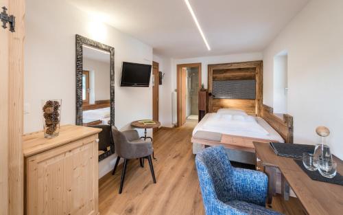 Posteľ alebo postele v izbe v ubytovaní Sporthotel Exclusive