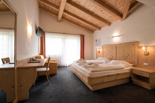 Cama o camas de una habitación en Garni Hotel Bel Vert